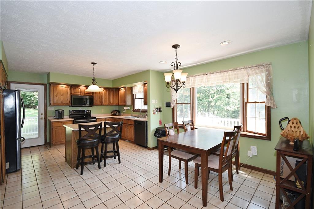 159 Klinger Road Canonsburg, PA 15317 - Photo 8 of 19 a view of a dining room with furniture window and outside view
