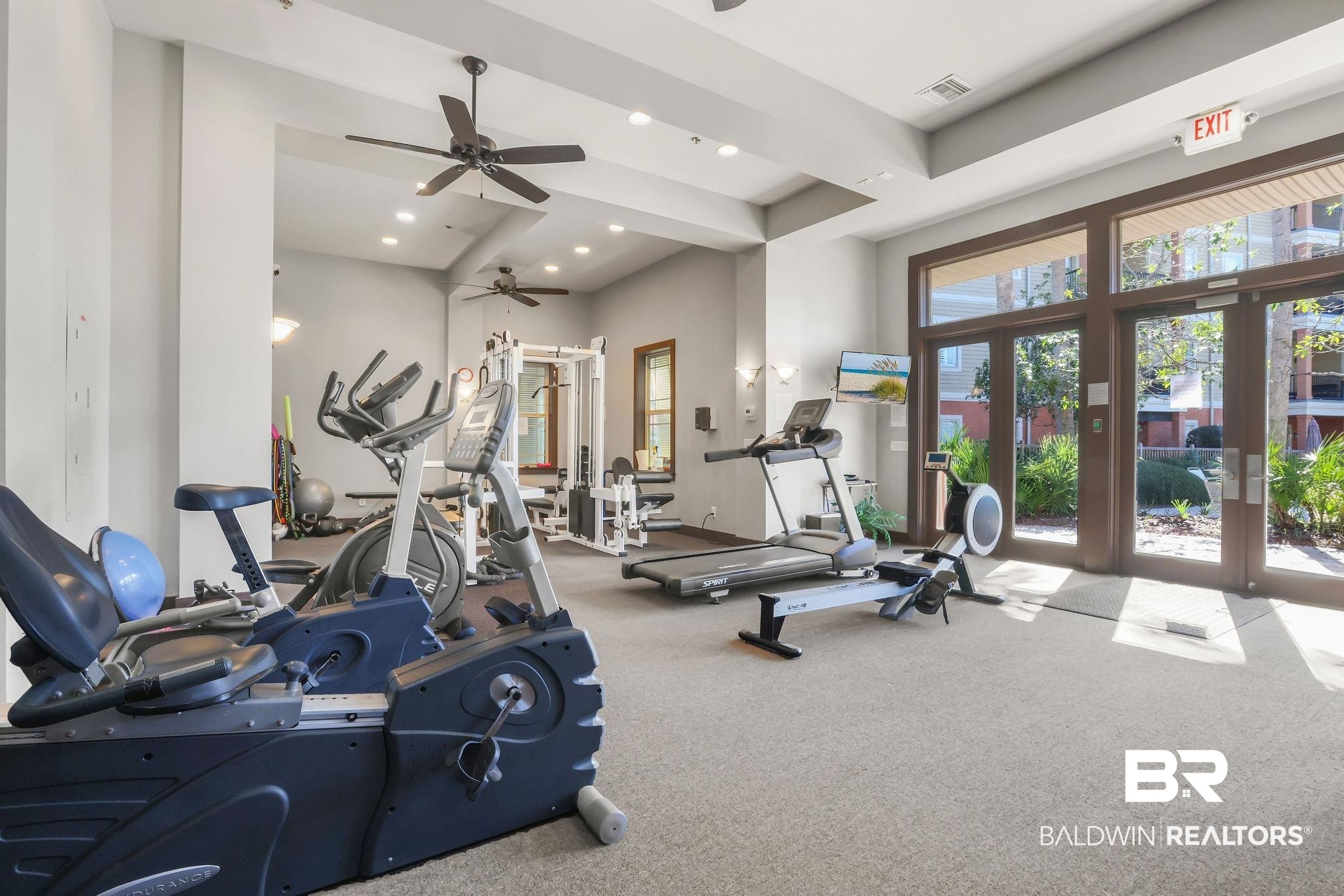 1430 Regency Road, Unit B302 Gulf Shores, AL 36542 - Photo 22 of 24 Workout area with visible vents, recessed lighting, french doors, and carpet