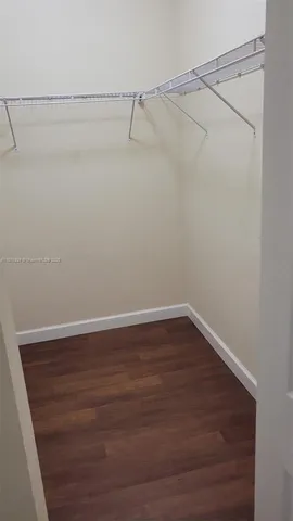 a view of a room with racks on the wall