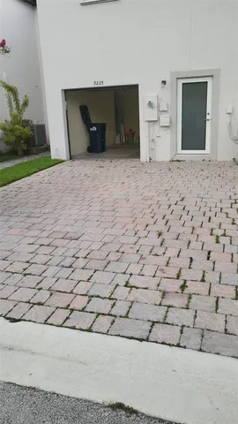 a view of empty room with a fireplace