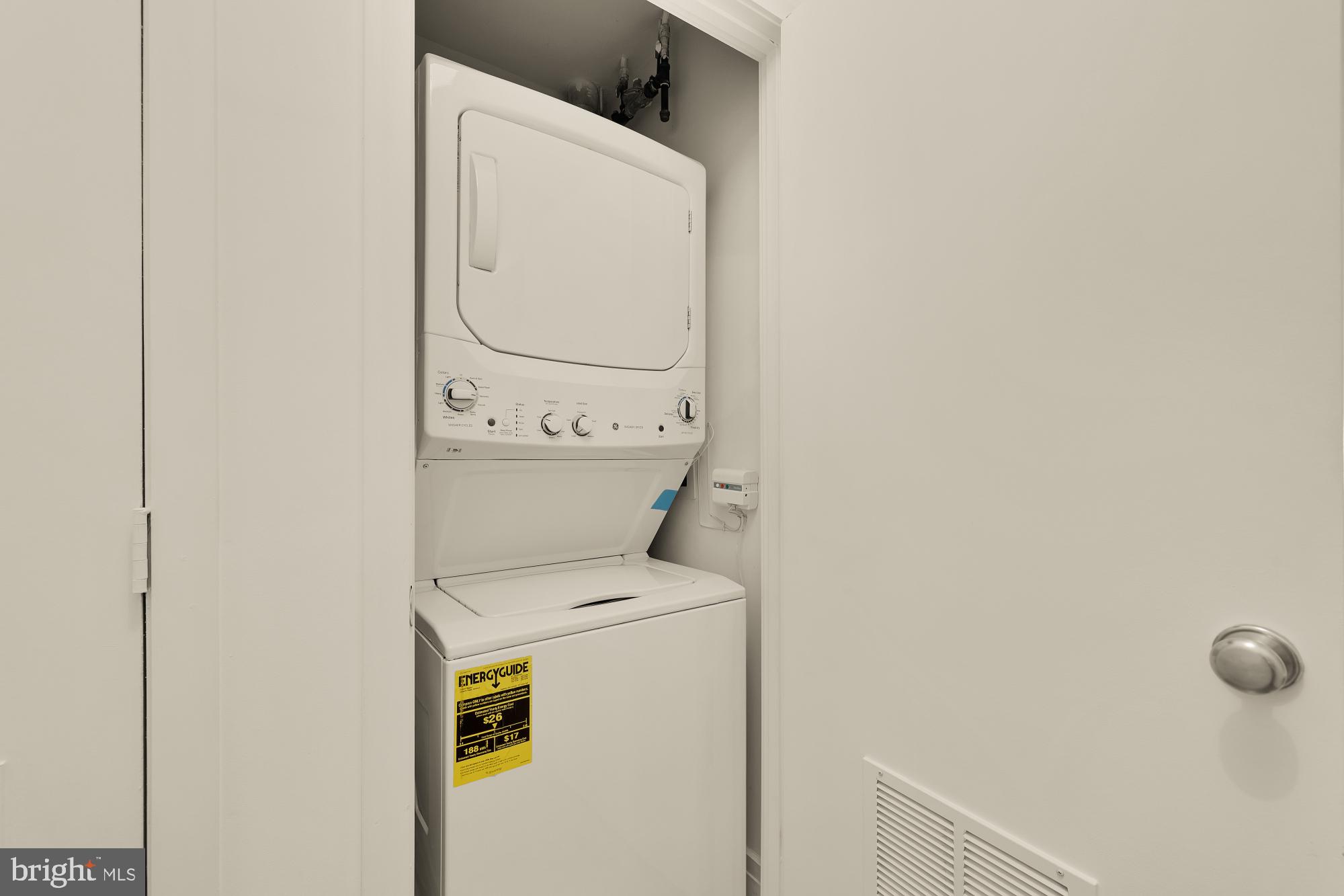 2020 12th Street Northwest, Unit 518 Washington, DC 20009 - Photo 14 of 28 a utility room with dryer and washer