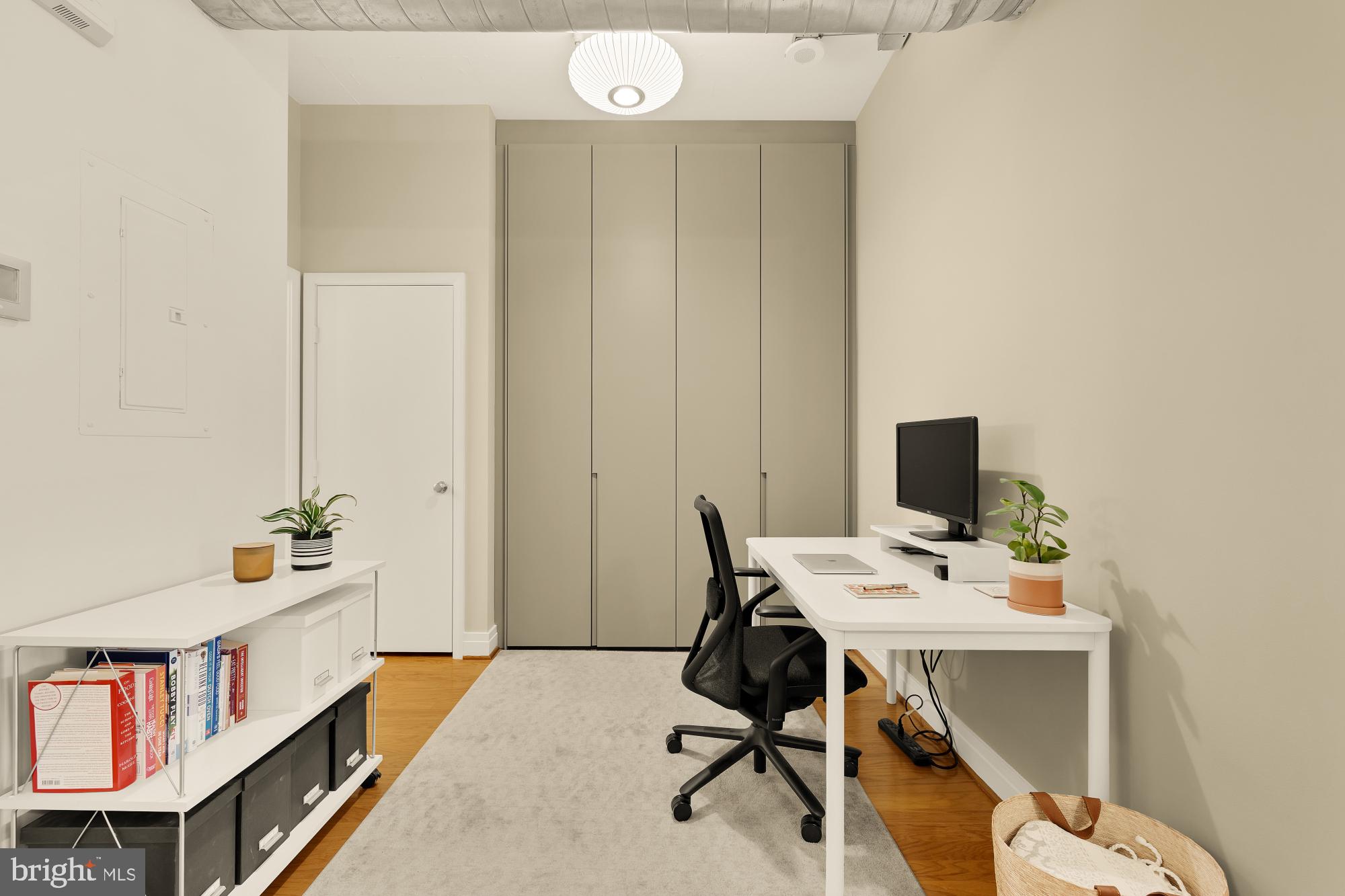 2020 12th Street Northwest, Unit 518 Washington, DC 20009 - Photo 4 of 28 a view of a workspace with furniture