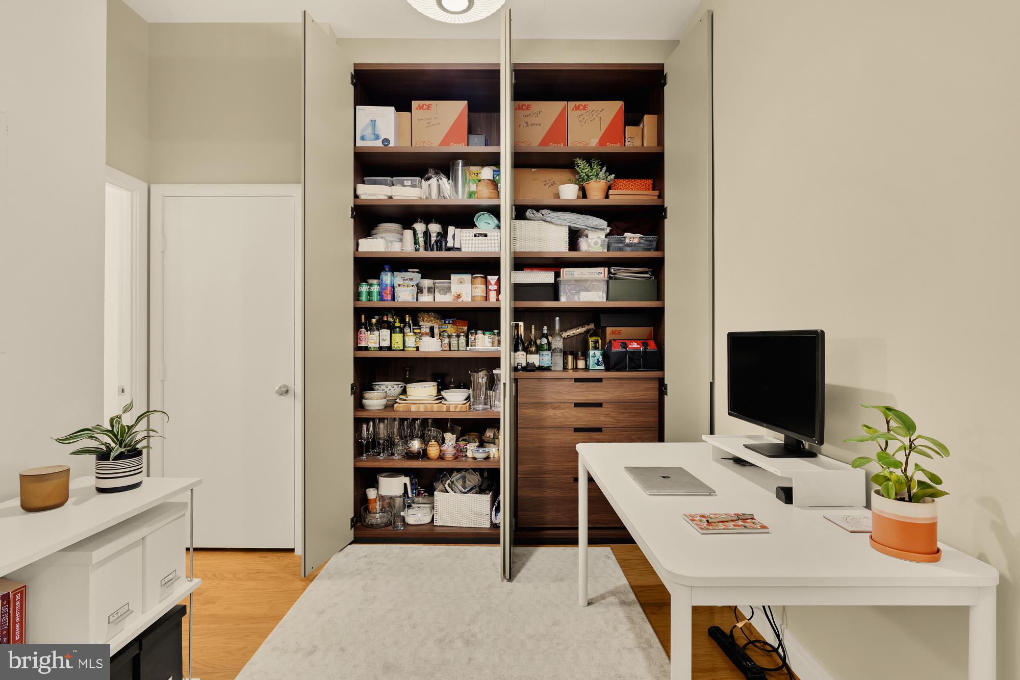 2020 12th Street Northwest, Unit 518 Washington, DC 20009 - Photo 5 of 28 a view of a workspace with furniture