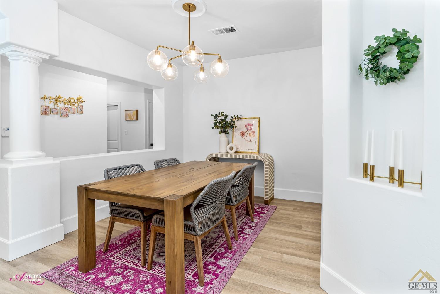 Undisclosed Address Bakersfield, CA 93311 - Photo 12 of 48 a view of a dining room with furniture