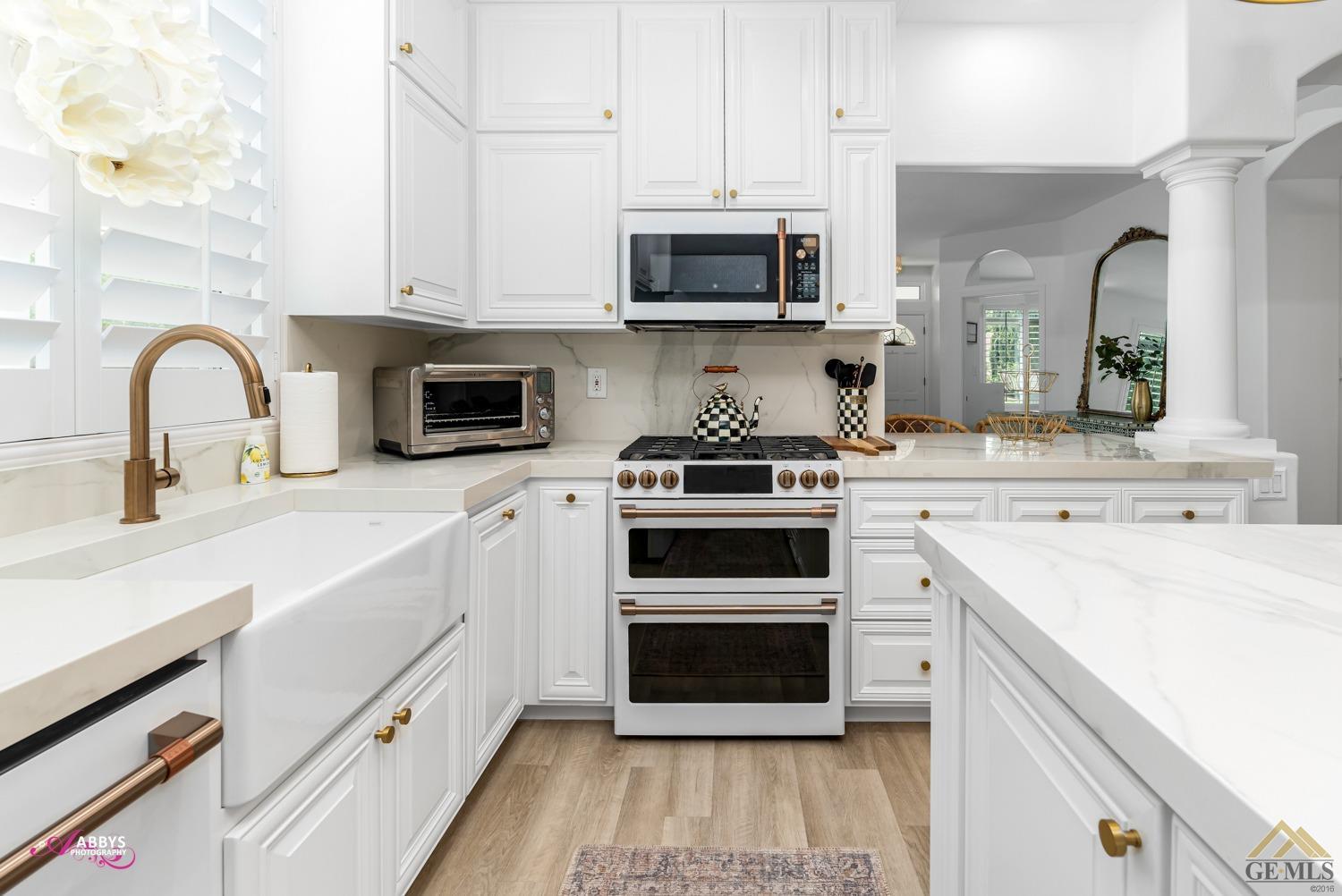 Undisclosed Address Bakersfield, CA 93311 - Photo 16 of 48 Newer appliances, backsplash and porcelain counters.