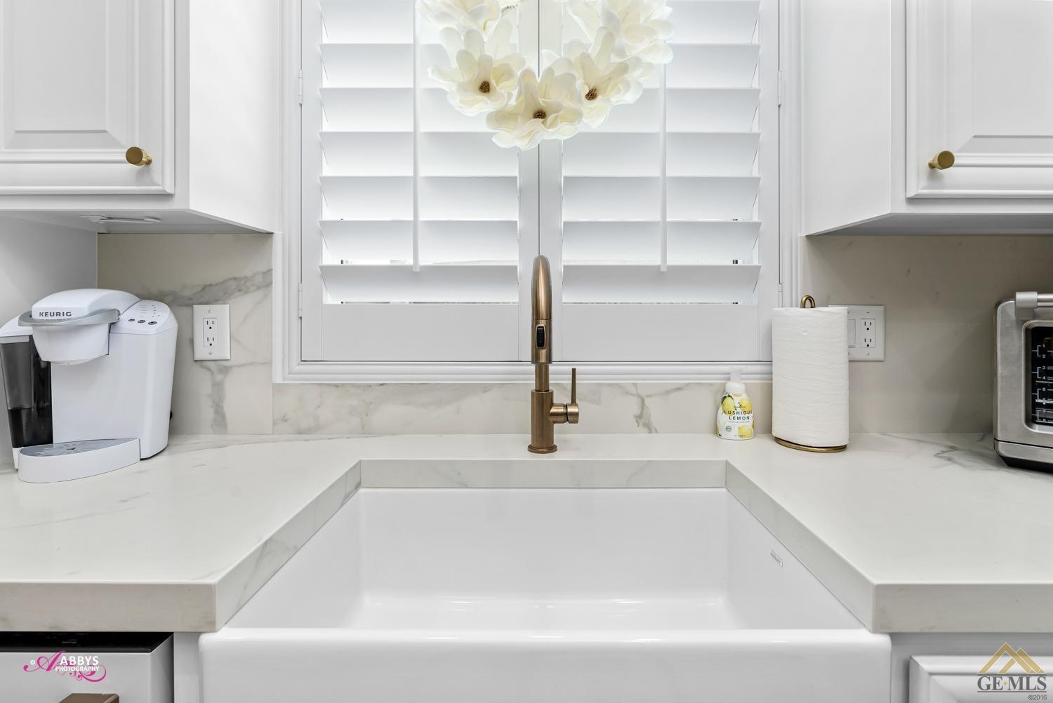 Undisclosed Address Bakersfield, CA 93311 - Photo 17 of 48 a bathroom with a bathtub and a window