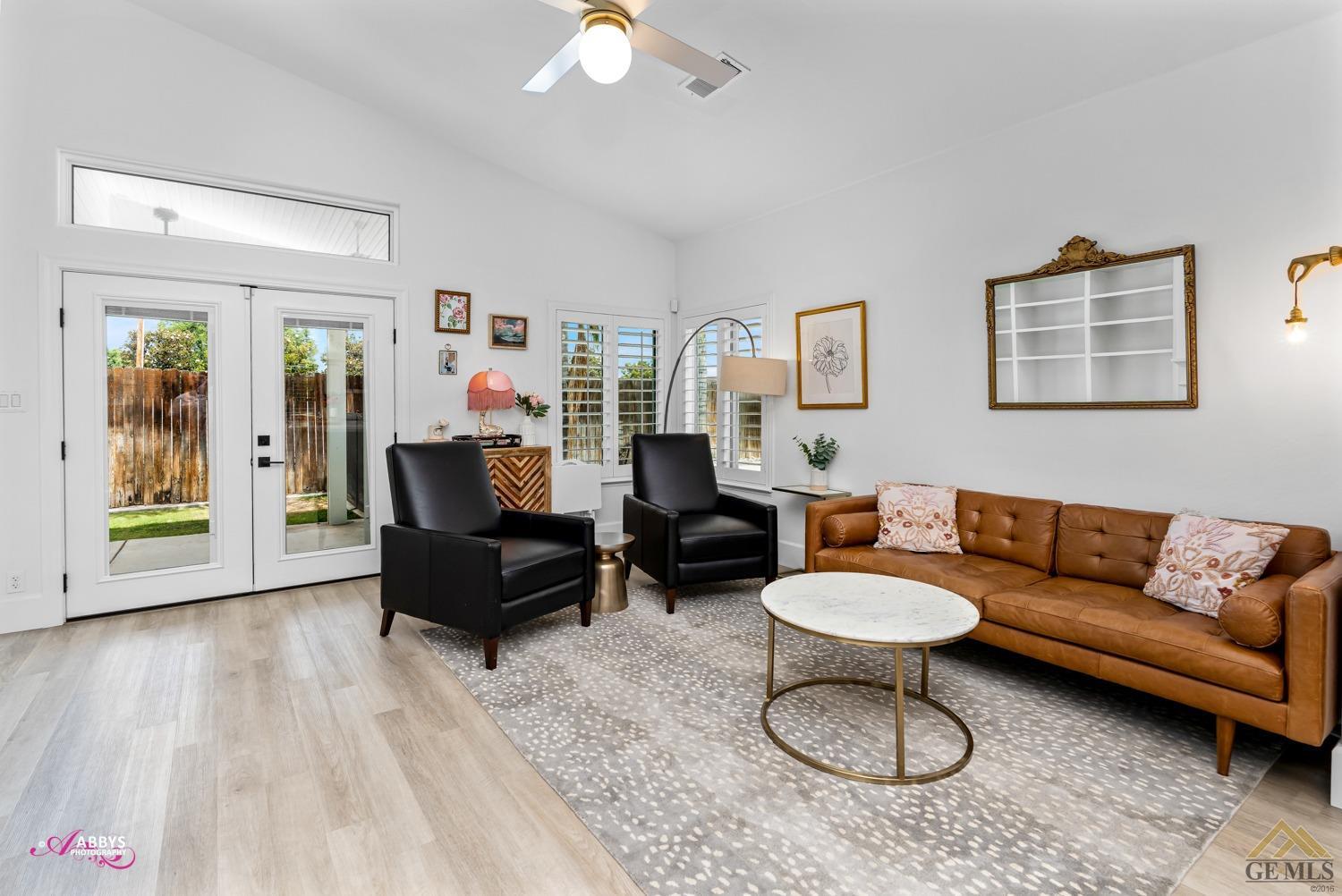 Undisclosed Address Bakersfield, CA 93311 - Photo 19 of 48 a living room with furniture and a rug