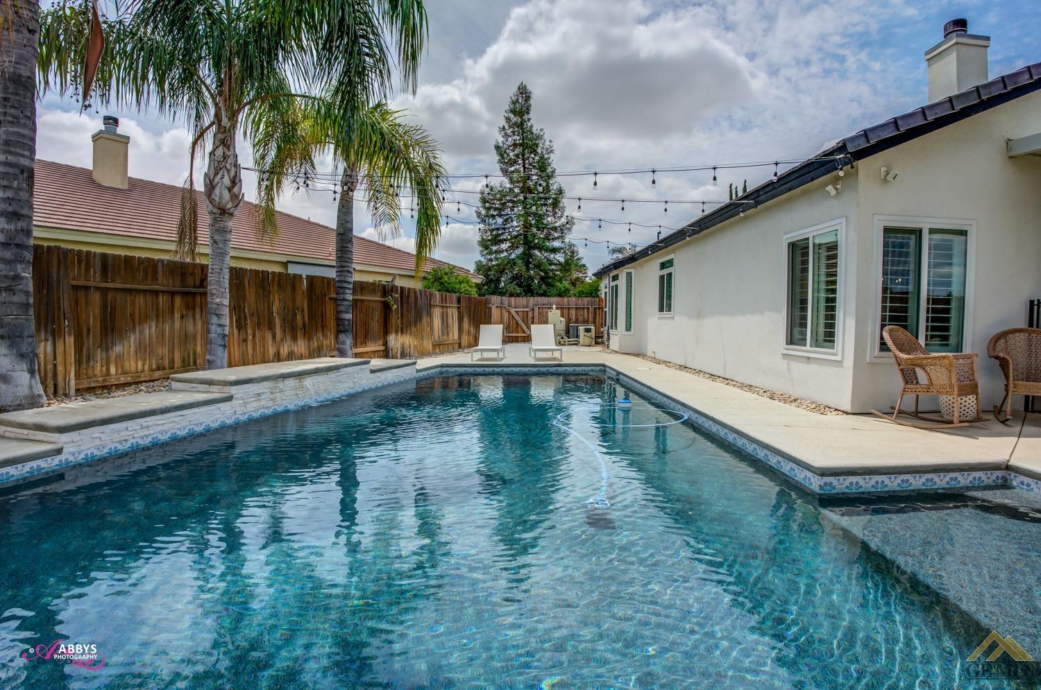 Undisclosed Address Bakersfield, CA 93311 - Photo 43 of 48 a view of a house with swimming pool