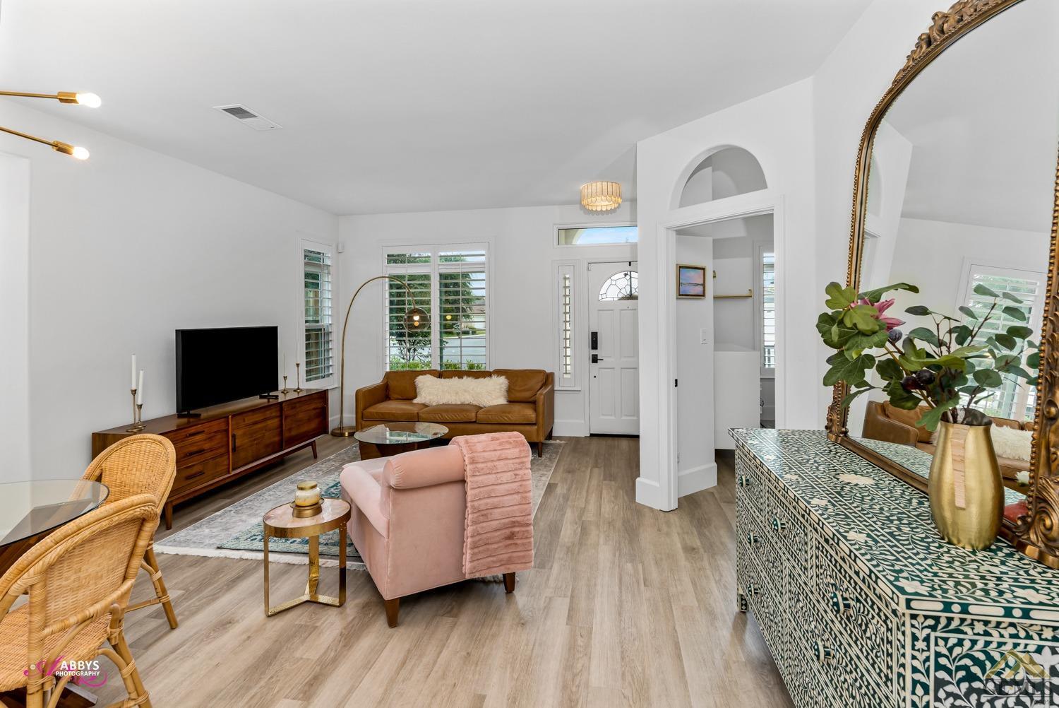 Undisclosed Address Bakersfield, CA 93311 - Photo 9 of 48 a living room with furniture floor and flat screen tv