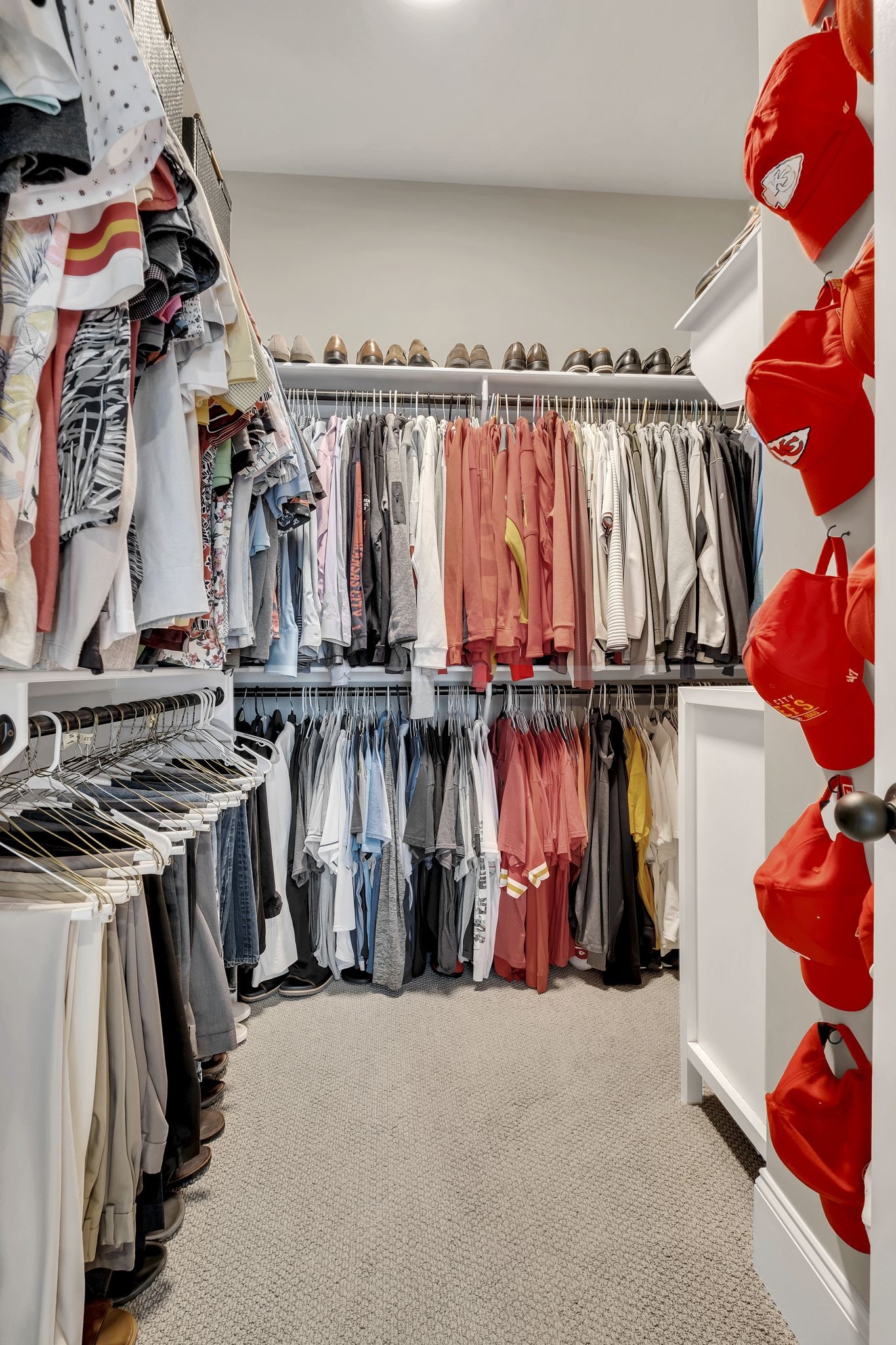 1043 Firestone Drive Franklin, TN 37067 - Photo 34 of 61 a view of walk in closet with clothes and shoes