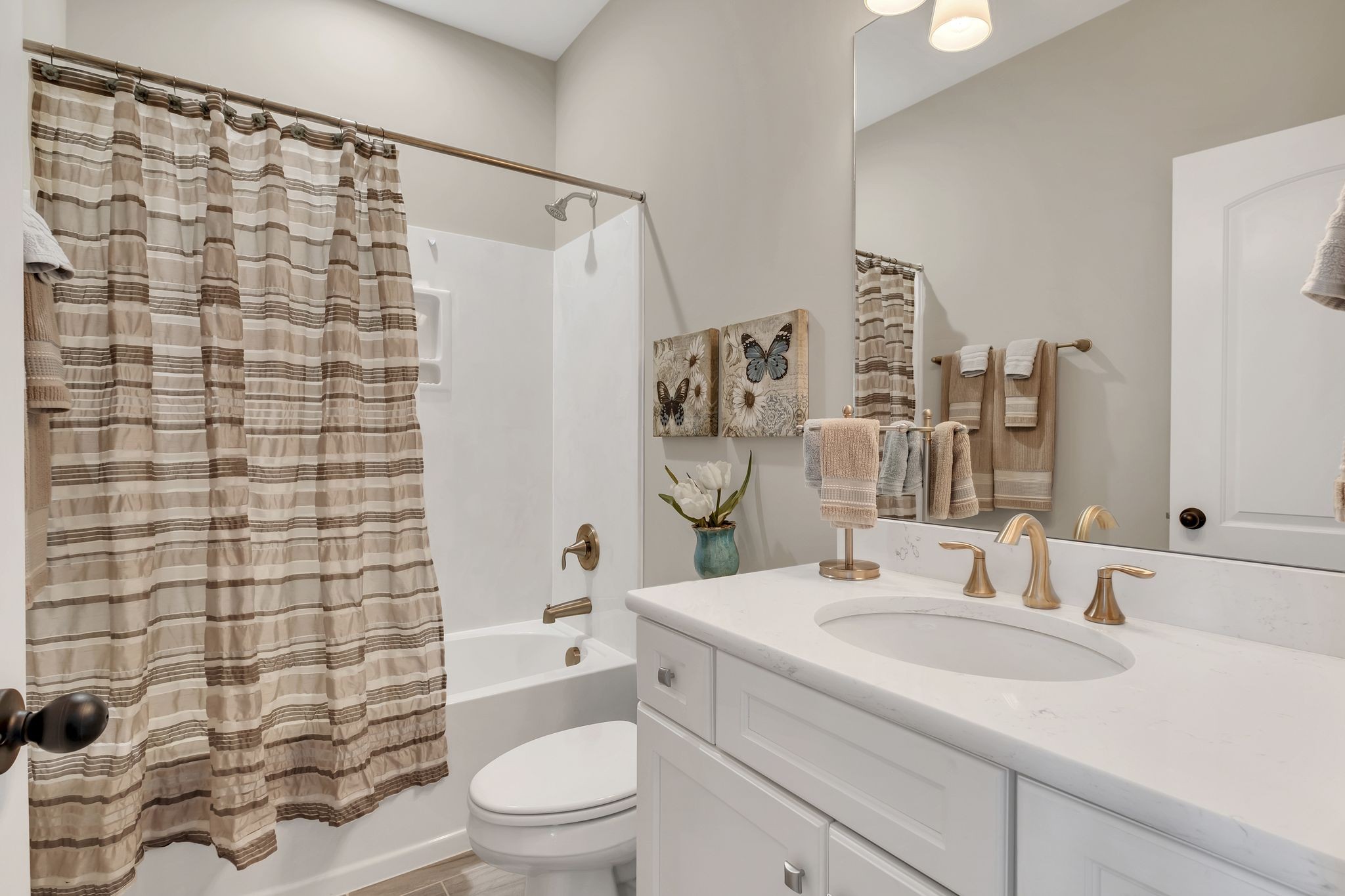 1043 Firestone Drive Franklin, TN 37067 - Photo 40 of 61 a bathroom with a sink toilet and shower