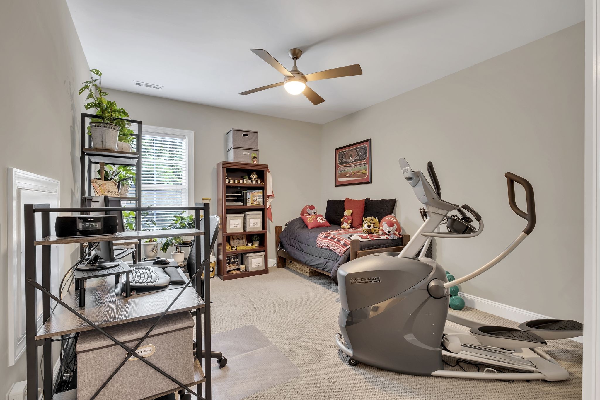 1043 Firestone Drive Franklin, TN 37067 - Photo 45 of 61 a living room with furniture a window and gym equipment