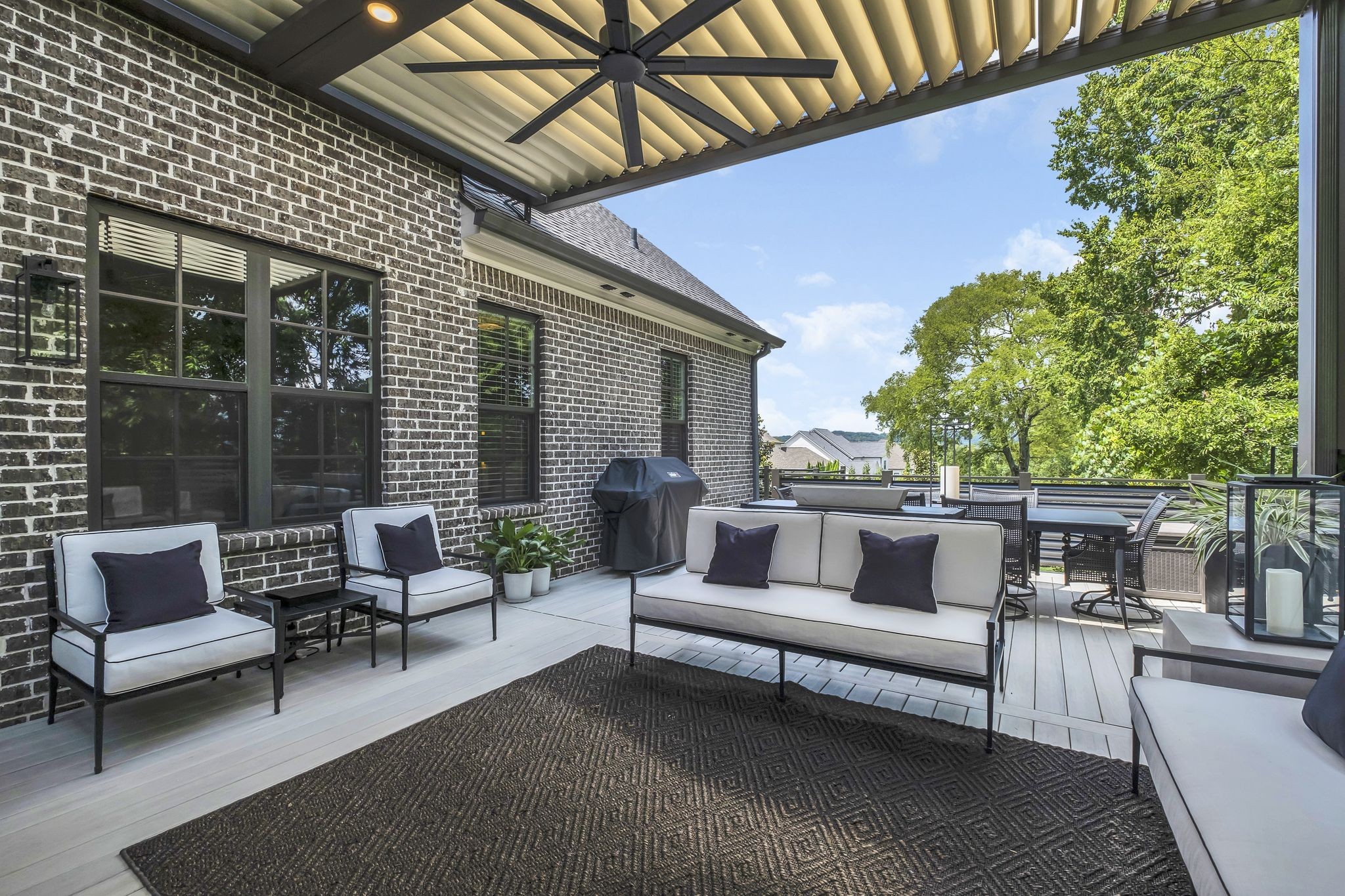 1043 Firestone Drive Franklin, TN 37067 - Photo 52 of 61 a outdoor living space with furniture and a fireplace