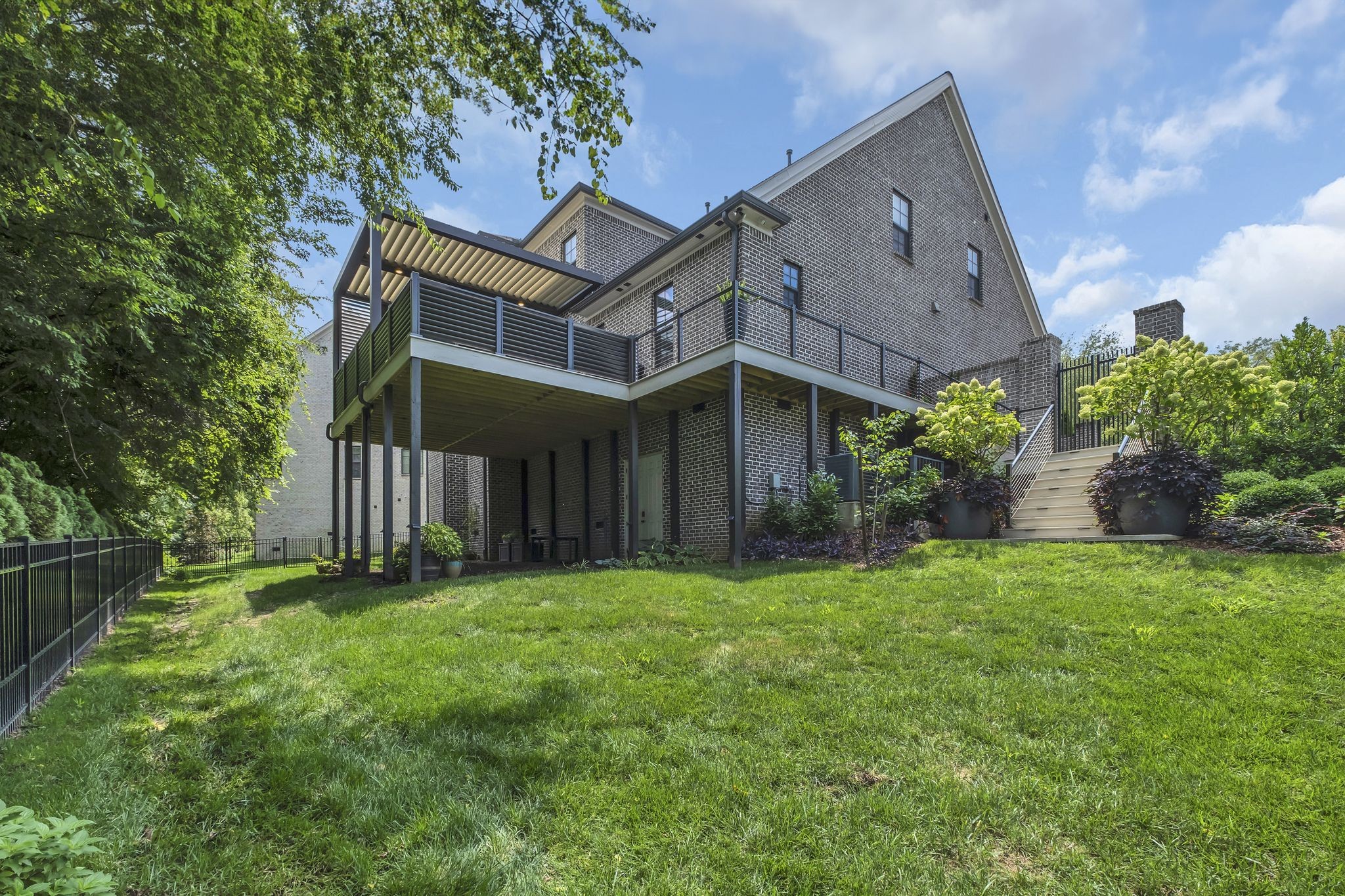 1043 Firestone Drive Franklin, TN 37067 - Photo 60 of 61 front view of a house with a yard