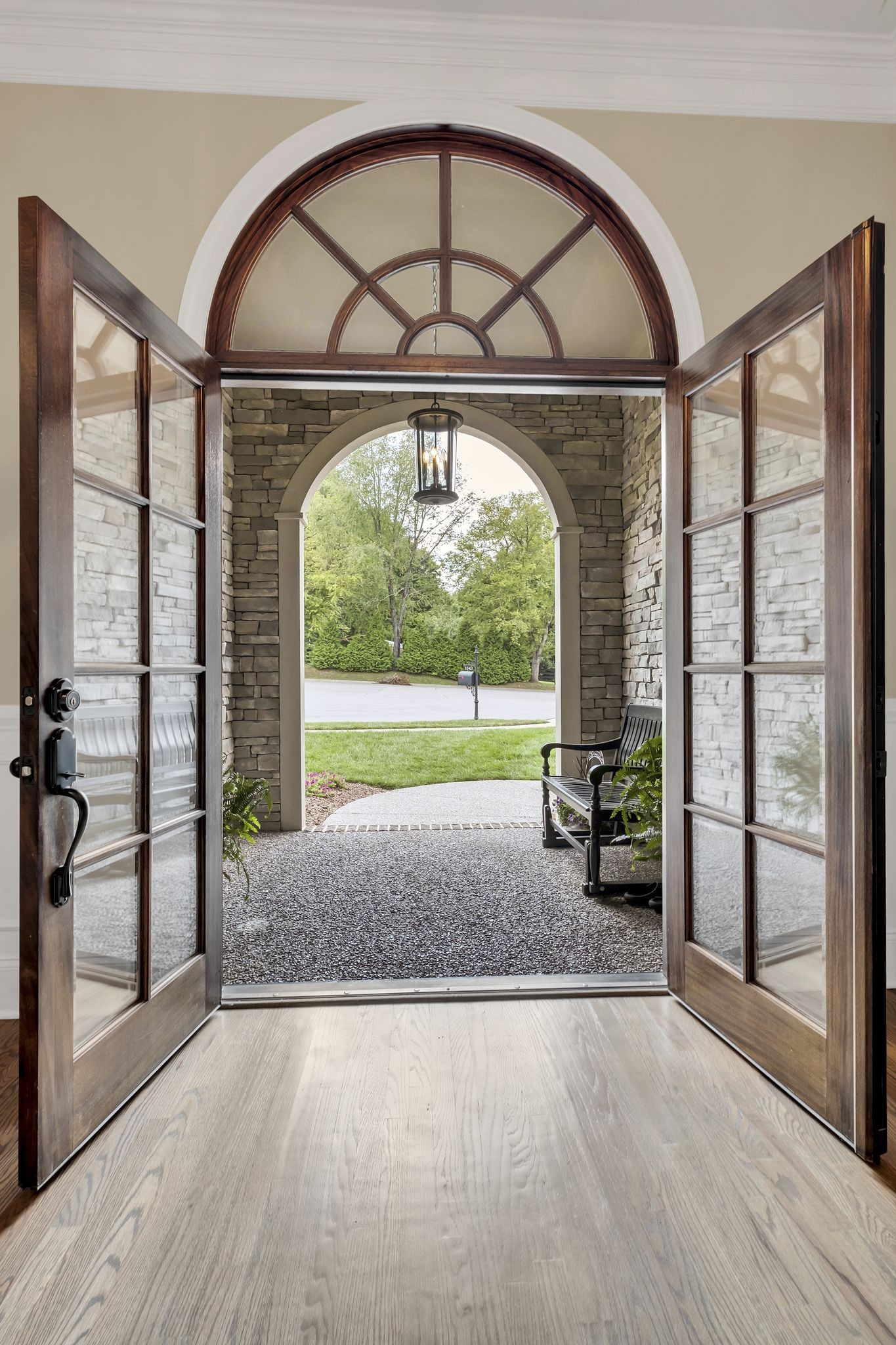 1043 Firestone Drive Franklin, TN 37067 - Photo 6 of 61 an empty room with floor to ceiling windows and wooden floor