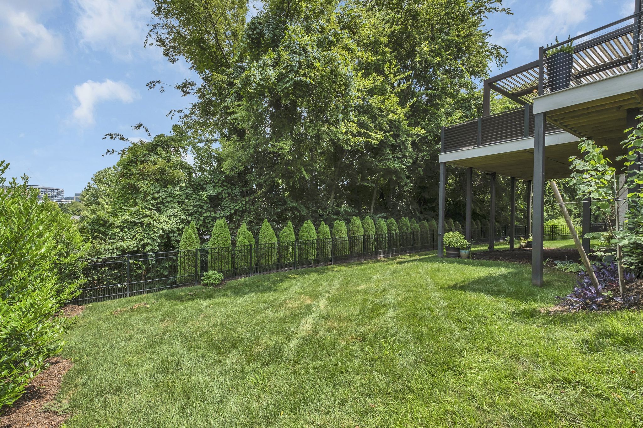 1043 Firestone Drive Franklin, TN 37067 - Photo 61 of 61 a view of backyard with table and chairs and potted plants