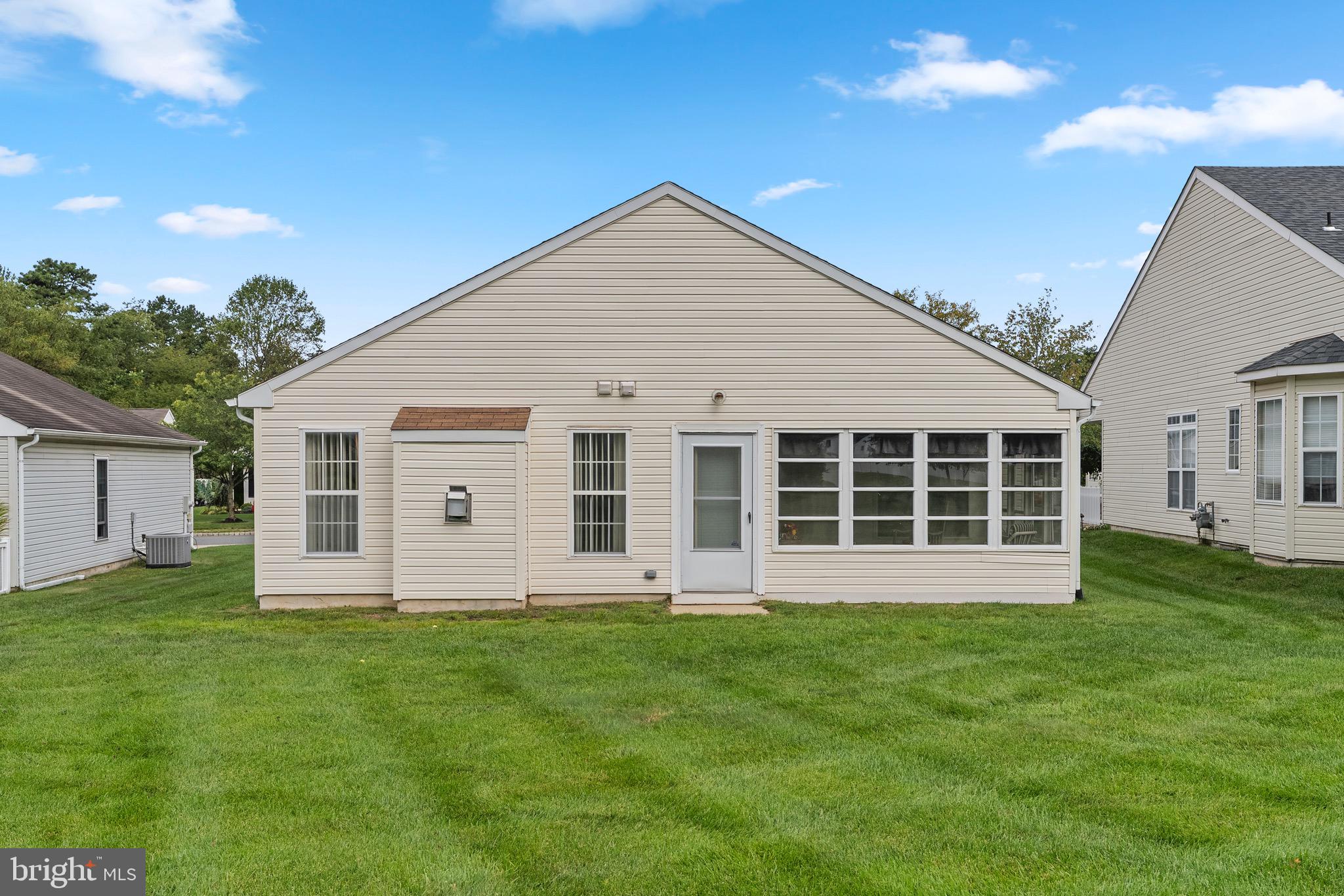 26 Carriage Berlin, NJ 08009 - Photo 18 of 19 a view of a house with a backyard