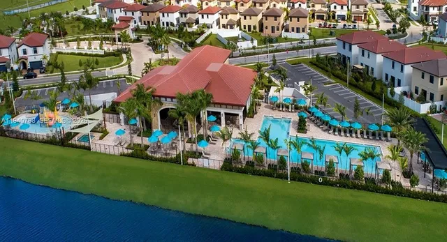 a view of a cafe with a table and chairs