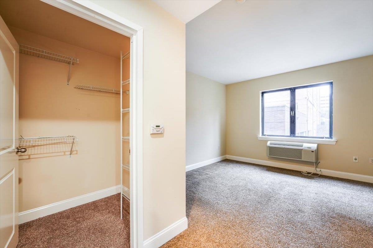 29 1st Street, Unit 408 Hackensack, NJ 07601 - Photo 12 of 29 a view of an empty room with a window