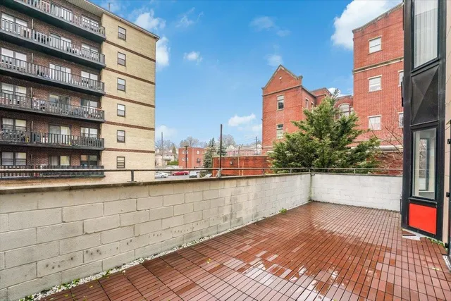 a view of roof with building