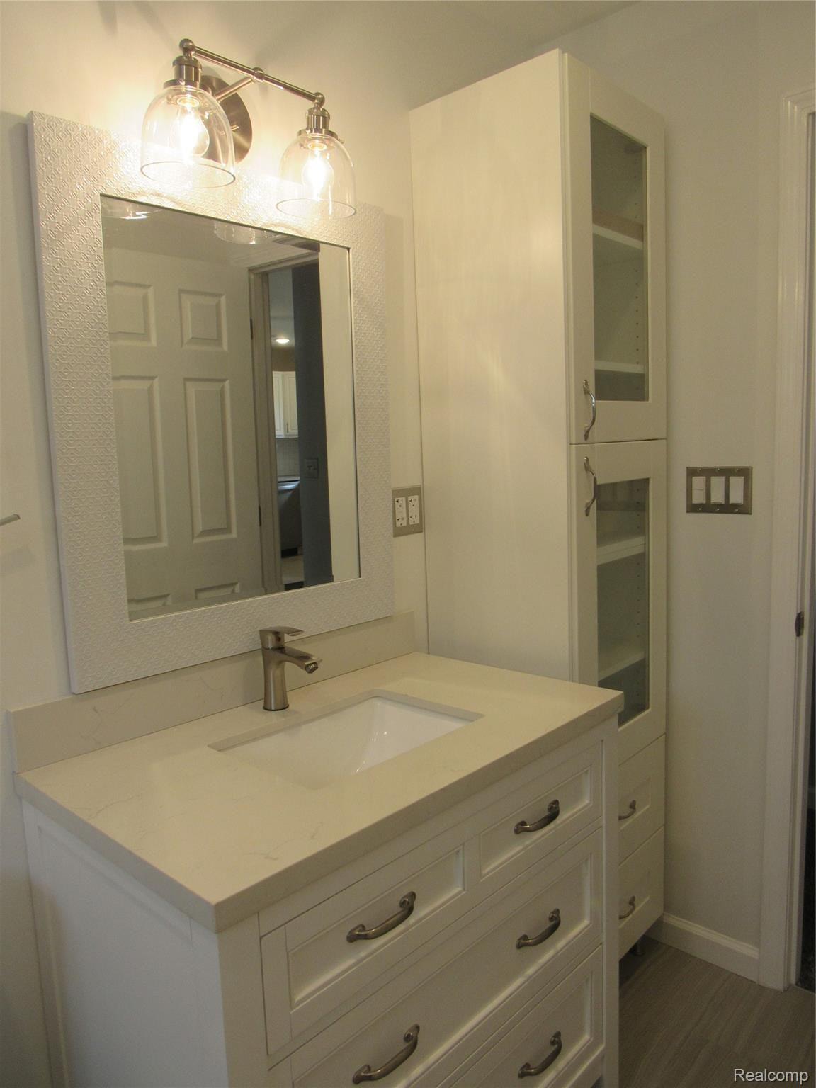 6764 Harding Street Taylor, MI 48180 - Photo 18 of 37 Granite counter top with under mount sink in the full bath!