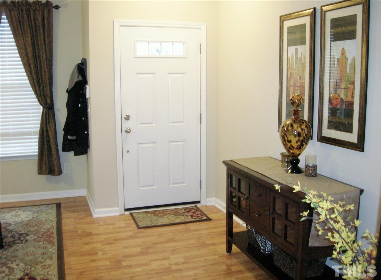 8308 City Loft Court Raleigh, NC 27613 - Photo 3 of 23 a view of an entryway with a door