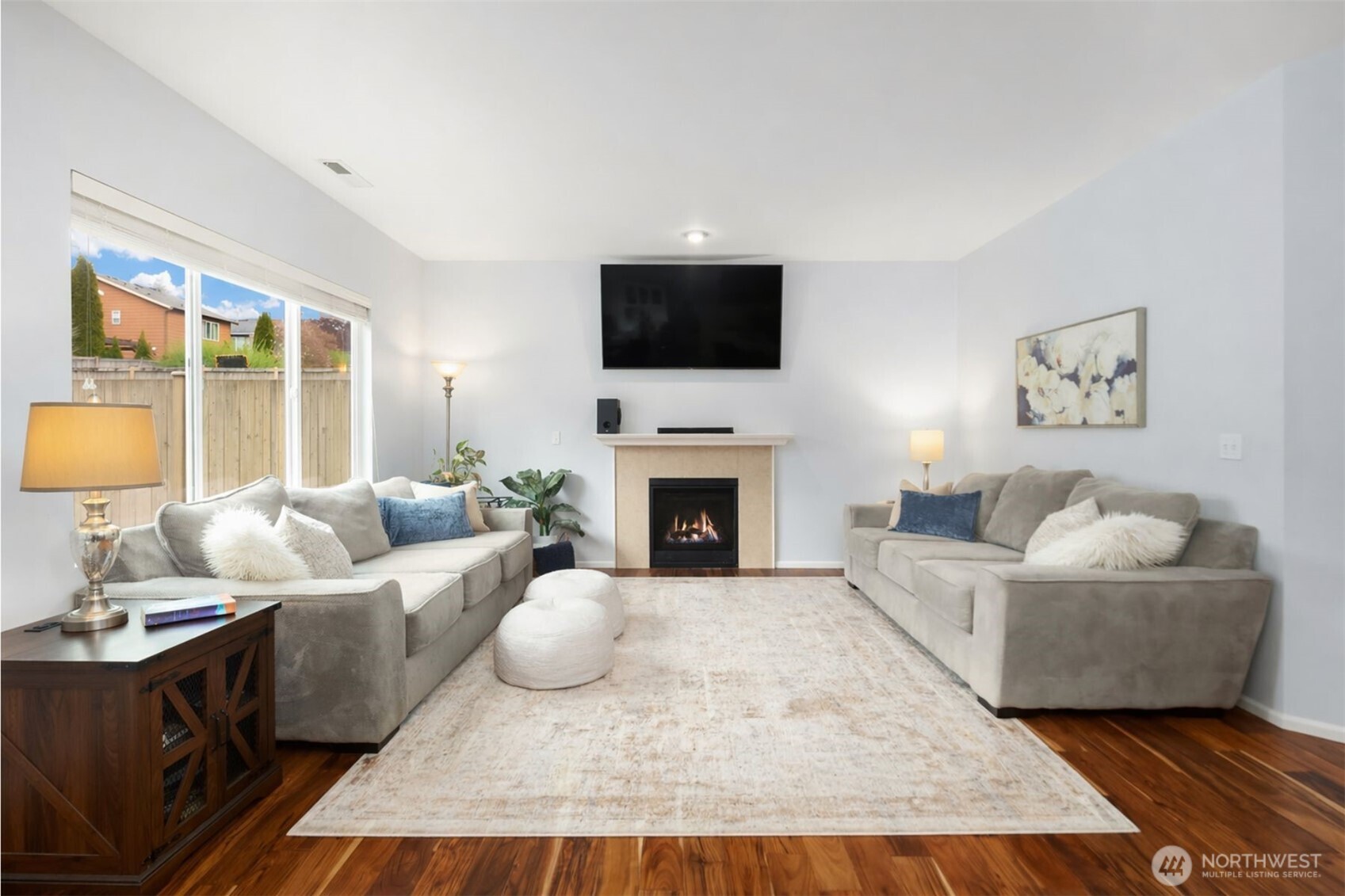 4119 167th Place Southeast Bothell, WA 98012 - Photo 7 of 39 a living room with furniture and a fireplace