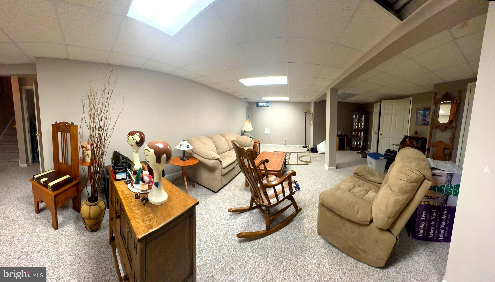 20 Wilson Way Delanco, NJ 08075 - Photo 24 of 38 a living room with furniture and a flat screen tv