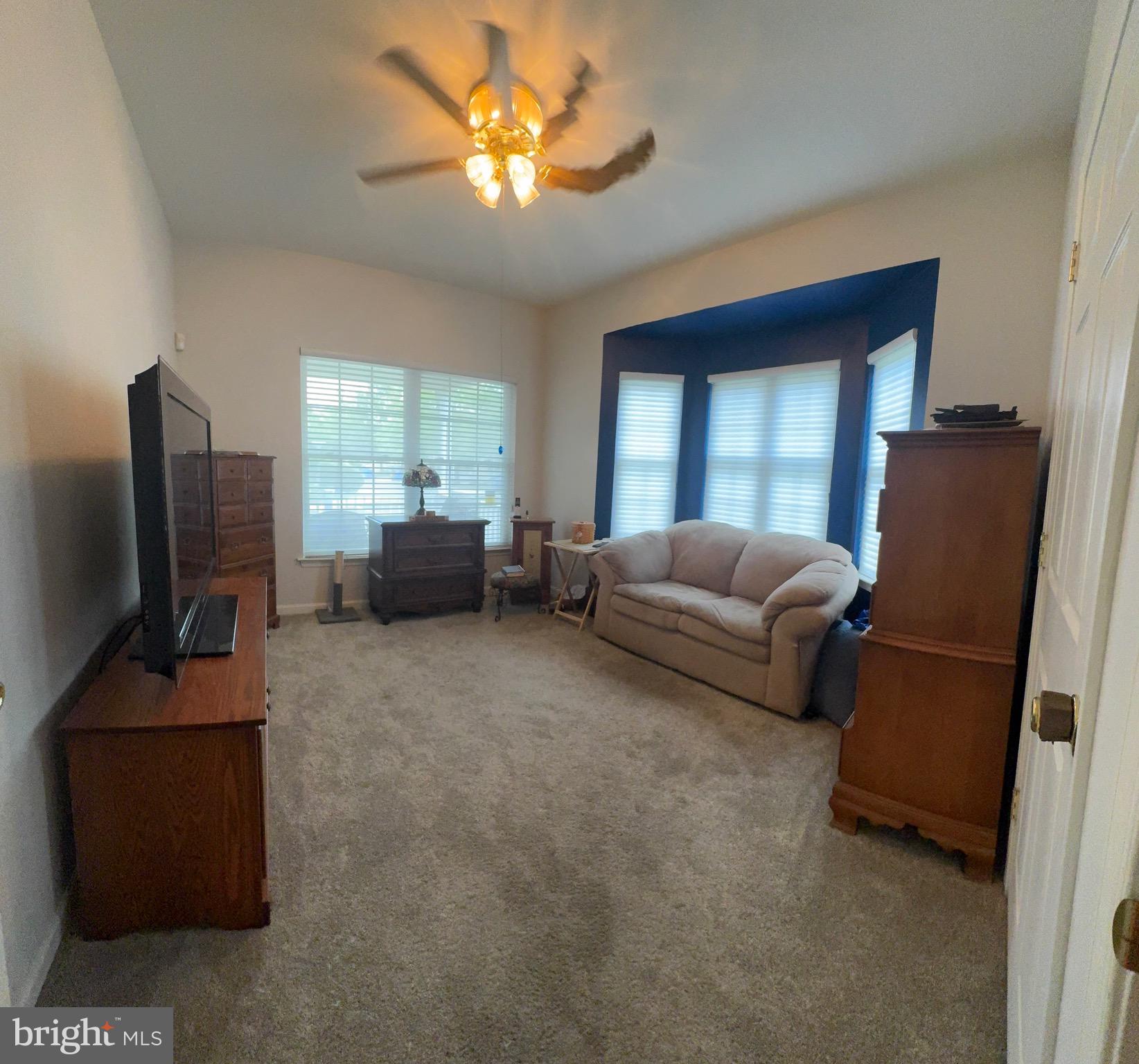 20 Wilson Way Delanco, NJ 08075 - Photo 30 of 38 a living room with furniture and a flat screen tv