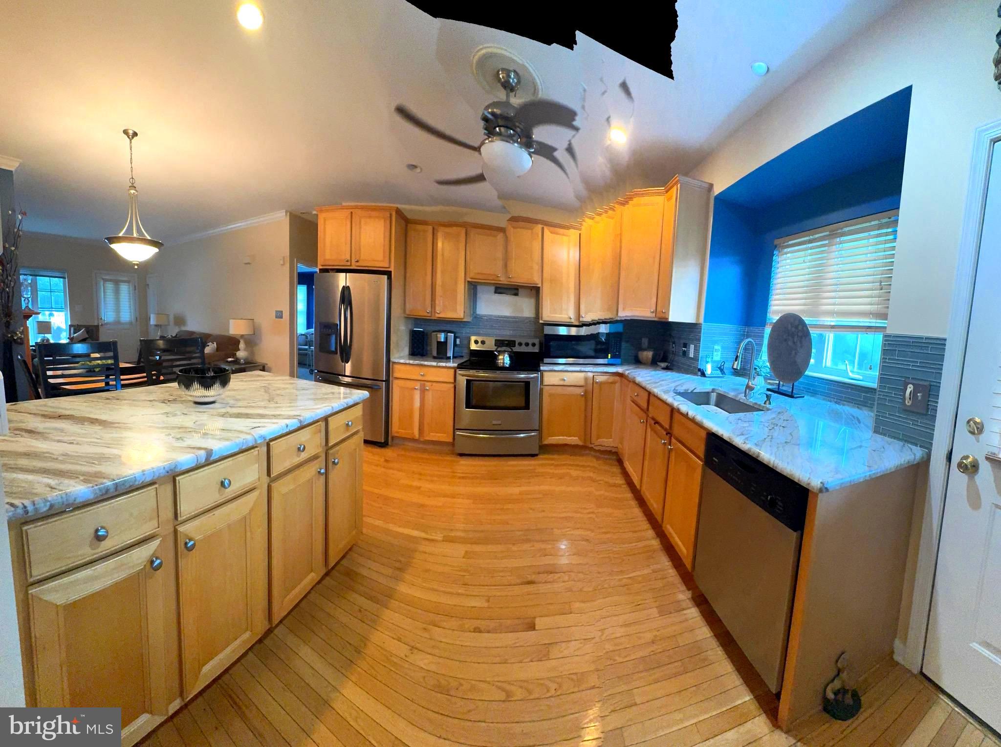 20 Wilson Way Delanco, NJ 08075 - Photo 8 of 38 a large kitchen with stainless steel appliances granite countertop a sink and cabinets