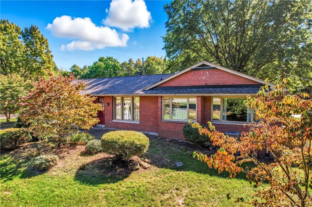 400 Hazen Road Sharpsville, PA 16150 - Photo 1 of 49 a front view of a house with garden