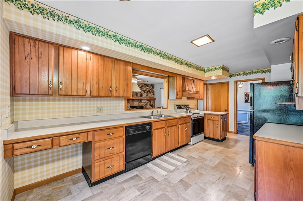 400 Hazen Road Sharpsville, PA 16150 - Photo 13 of 49 a large kitchen with stainless steel appliances granite countertop a sink and cabinets