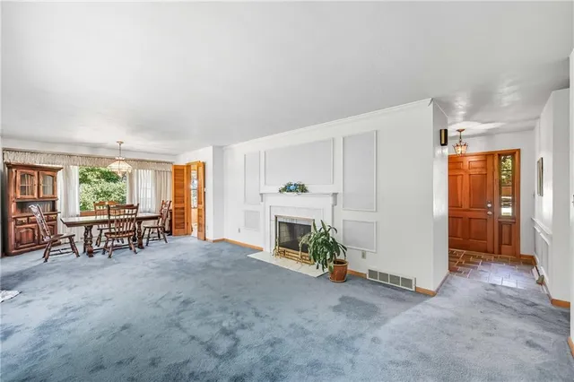 a view of livingroom with furniture and fireplace