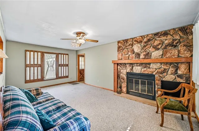 a bedroom with a bed and a chair