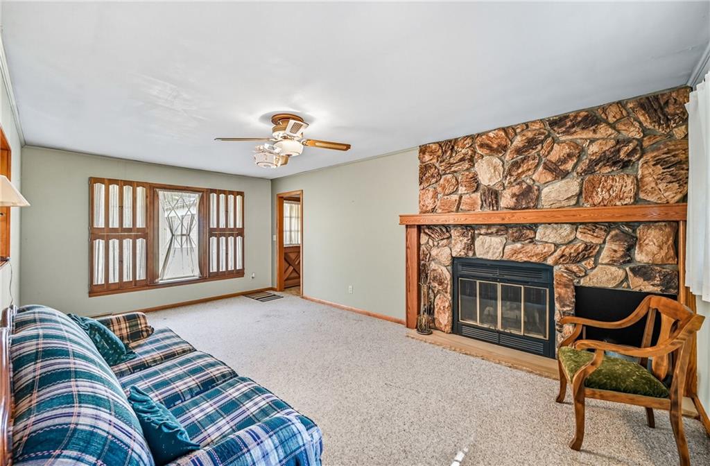 400 Hazen Road Sharpsville, PA 16150 - Photo 8 of 49 a bedroom with a bed and a chair