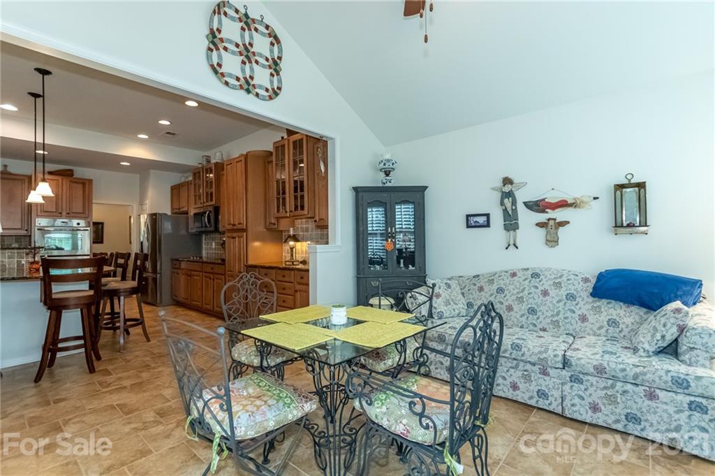 7116 Meyer Road Fort Mill, SC 29715 - Photo 11 of 31 a view of a dining room with furniture