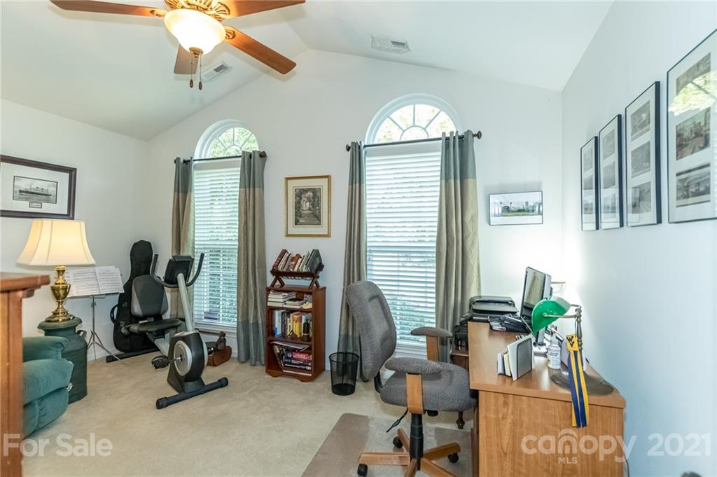 7116 Meyer Road Fort Mill, SC 29715 - Photo 22 of 31 a view of a livingroom with workspace and a window