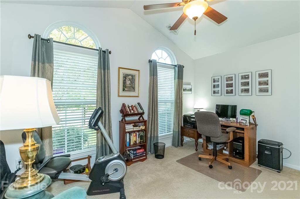 7116 Meyer Road Fort Mill, SC 29715 - Photo 23 of 31 a view of a workspace with furniture and a window