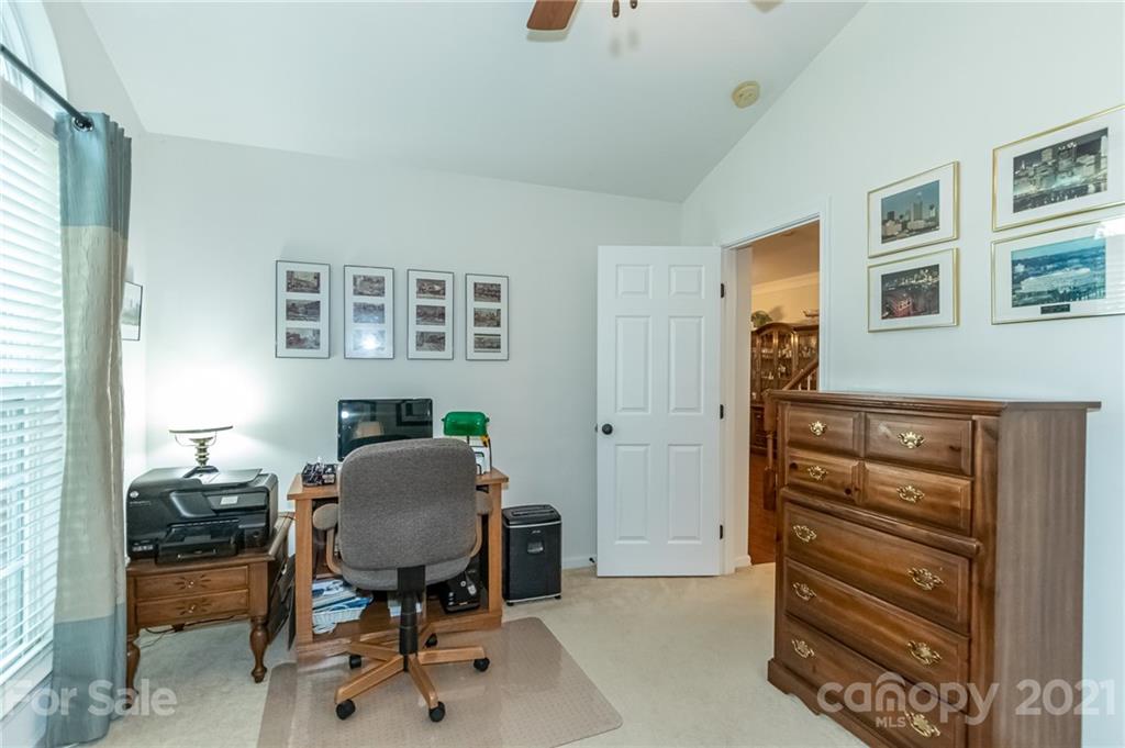 7116 Meyer Road Fort Mill, SC 29715 - Photo 24 of 31 a workspace with furniture and a window