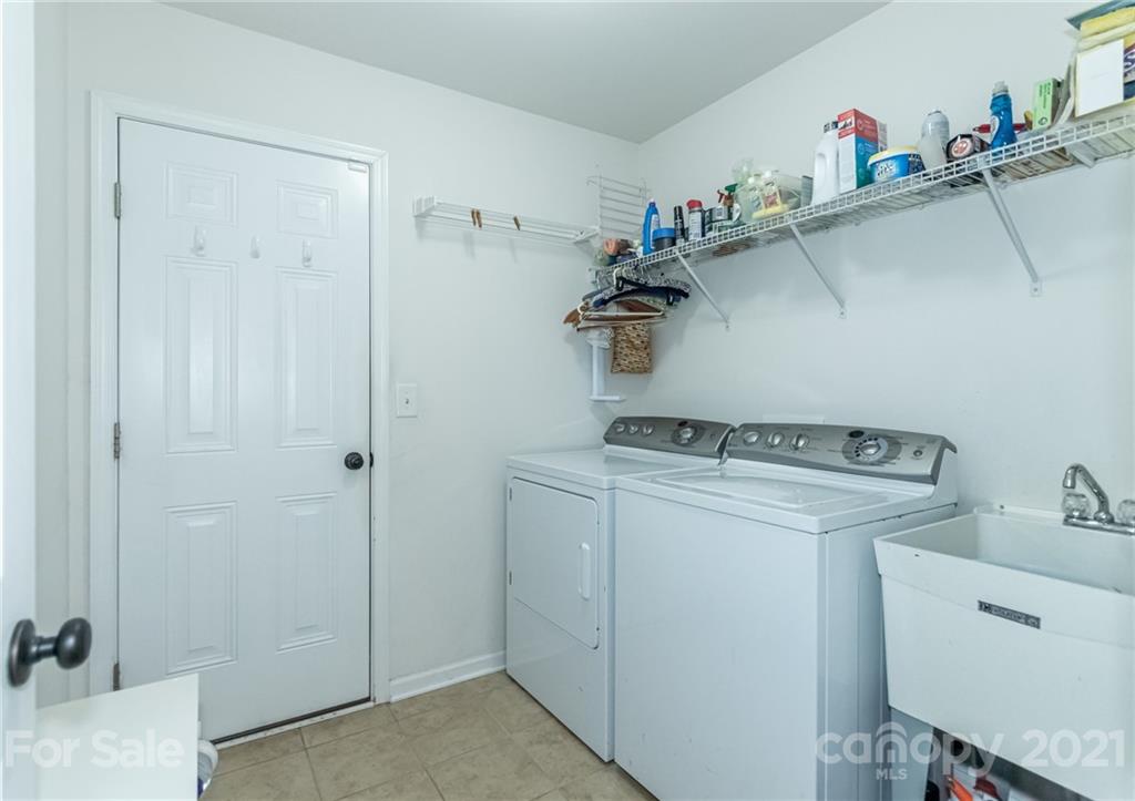 7116 Meyer Road Fort Mill, SC 29715 - Photo 27 of 31 a utility room with dryer and washer