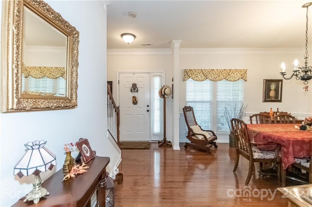 7116 Meyer Road Fort Mill, SC 29715 - Photo 5 of 31 a view of a livingroom with furniture and a gym equipment