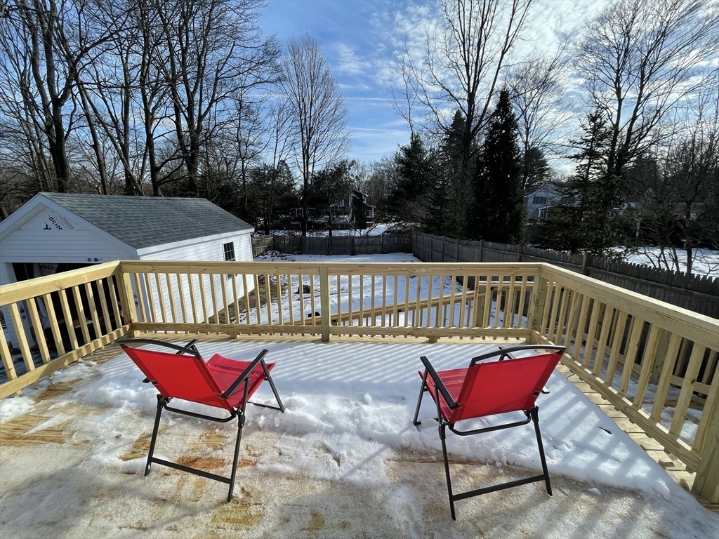 8 Pike Street Hopkinton, MA 01748 - Photo 33 of 34 a view of balcony with furniture and wooden floor