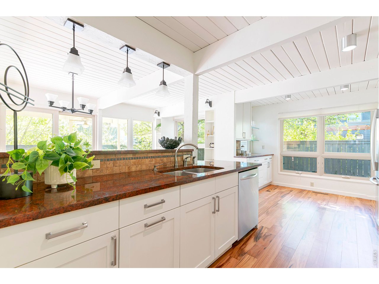 3856 14th Street Boulder, CO 80304 - Photo 10 of 48 Generous counter lighting enhances the already sun-filled interior