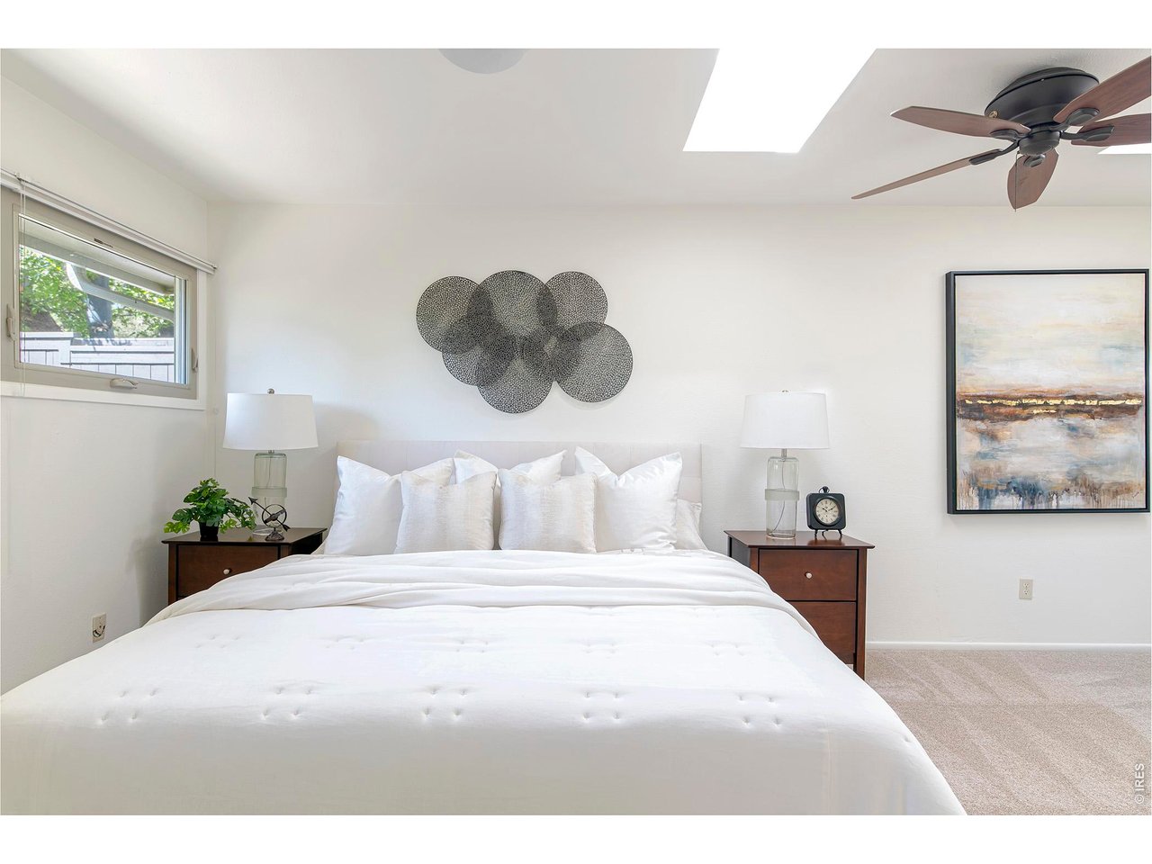 3856 14th Street Boulder, CO 80304 - Photo 19 of 48 Spacious primary bedroom with soft natural light and a calming atmosphere