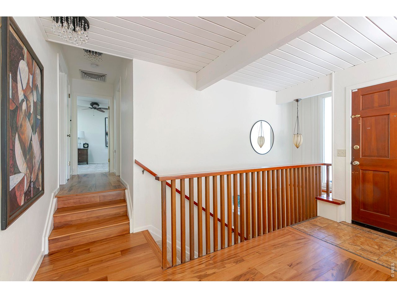 3856 14th Street Boulder, CO 80304 - Photo 37 of 48 Bright entryway showcasing beautiful wood floors and soft lighting