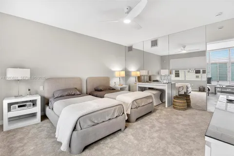 a bed room with bed and a couch