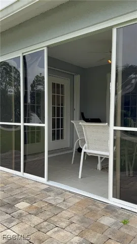 a view of a dining room with furniture wooden floor and garden