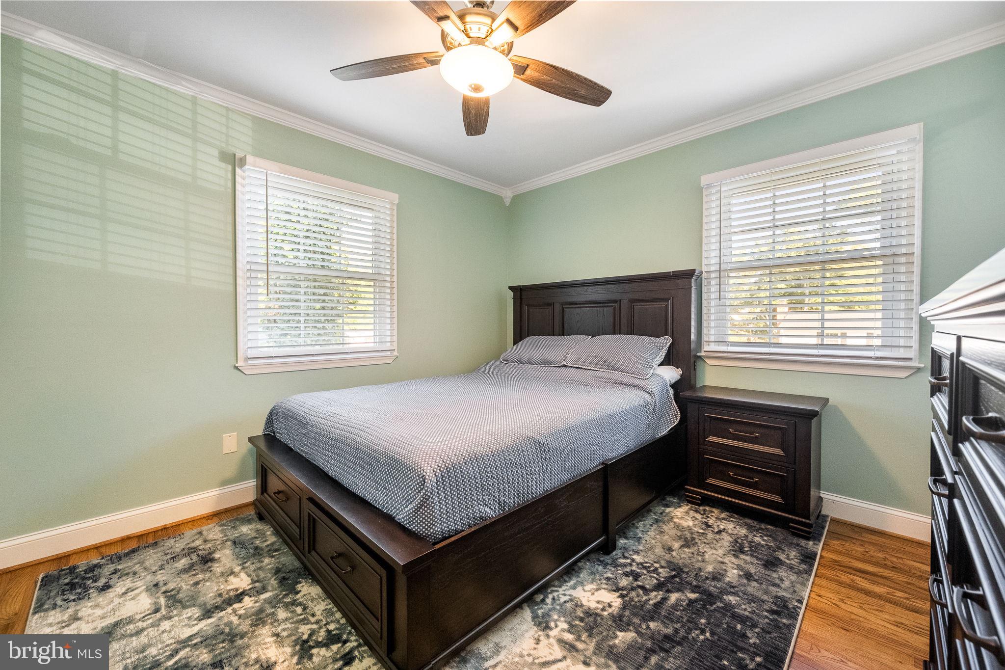 7203 Hadlow Drive Springfield, VA 22152 - Photo 19 of 39 a bedroom with a bed and a window