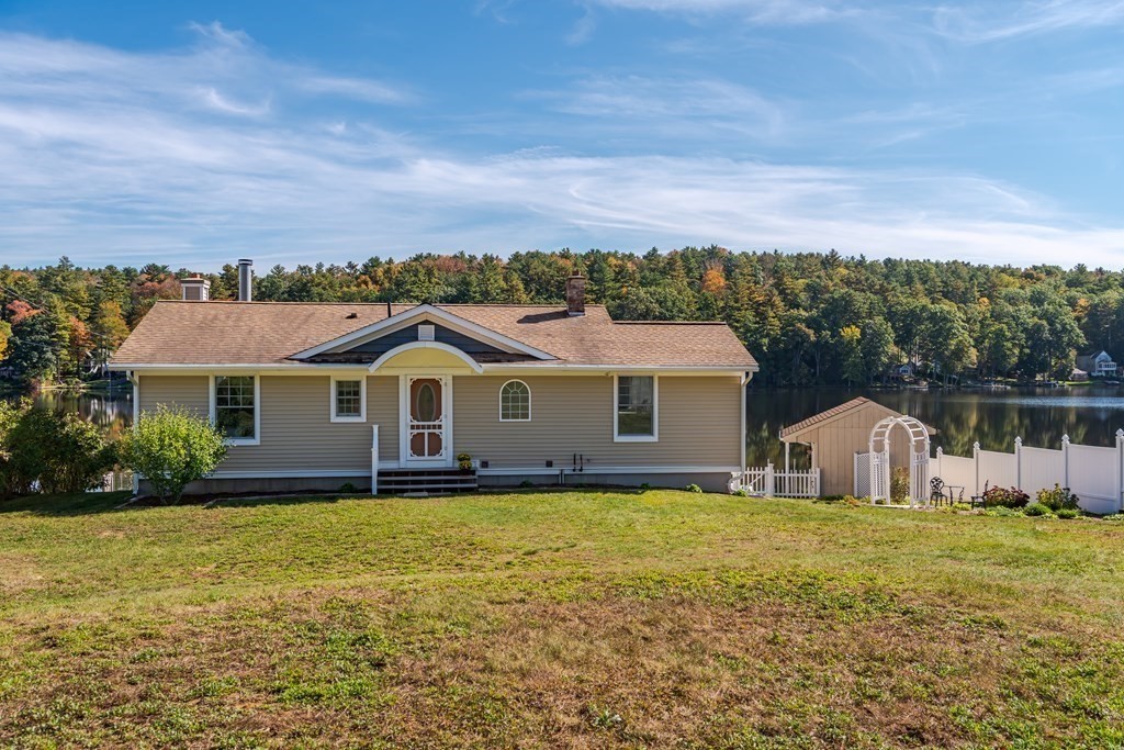 23 Craig Road Holland, MA 01521 - Photo 3 of 40 a front view of a house with a garden