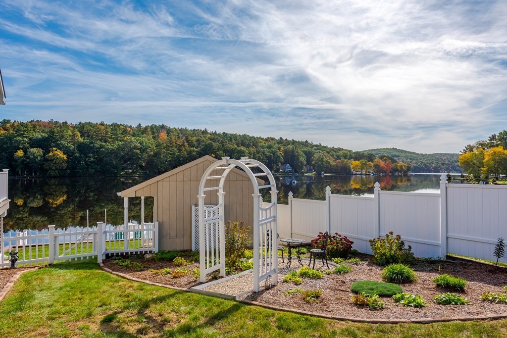 23 Craig Road Holland, MA 01521 - Photo 32 of 40 a view of a house with backyard and sitting area